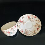 teal dark pink floral tea cup and saucer