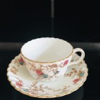 teal dark pink floral tea cup and saucer