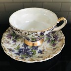 Purple Violets heavy gold trim tea cup and saucer