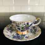 Purple Violets heavy gold trim tea cup and saucer