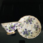 Purple Violets heavy gold trim tea cup and saucer