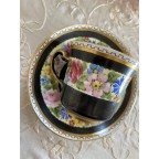 Antique black Handpainted black tea cup and saucer