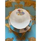 Bone china blue tea cup and saucer with thistles