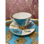 Bone china blue tea cup and saucer with thistles