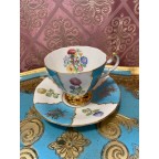 Bone china blue tea cup and saucer with thistles