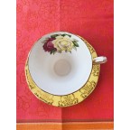 Vintage bright yellow Queen Anne tea cup and saucer