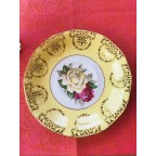 Vintage bright yellow Queen Anne tea cup and saucer