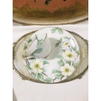 Handpainted round plate with tea cup