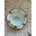 Gold striped floral tea cup and saucer